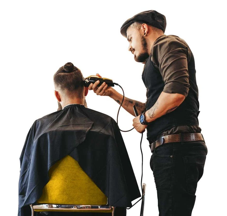 man receiving haircut